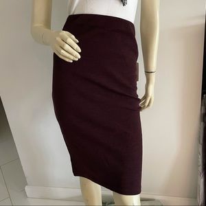 Stretchy knit pencil skirt with back slit